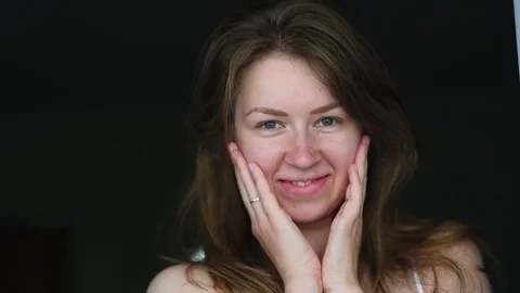 Young beautiful girl posing at the camera Stock Footage 75985367