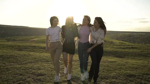 Young beautiful girlfriends having fun Stock Footage 130473452