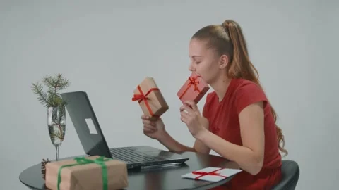 Young beautiful lady does not know which gift to choose and she asks a friend Stock Footage 157937247