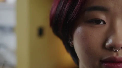 A young beautiful lady is looking to the camera Stock Footage 170464135