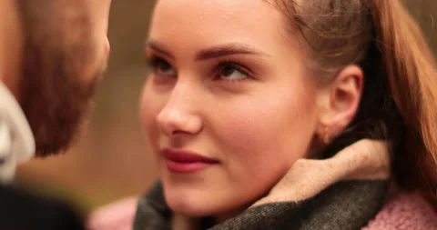 A young, beautiful, loving couple walking on a gloomy autumn day Stock-Footage 247488332