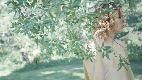 Young beautiful model posing in forest. Fashion. Photo session Stock Footage 76293313
