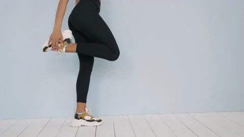 Young beautiful model stretching out before training Stock Footage 161325656