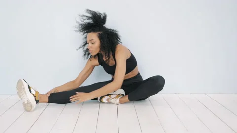 Young beautiful model stretching out before training Stock Footage 161337852