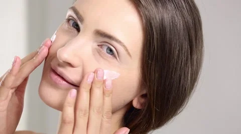 Young beautiful perfect model applying professional makeup Stock Footage 65214478