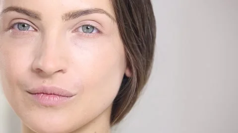 Young beautiful perfect model applying professional makeup Stock Footage 65233251