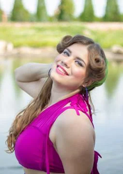 Young beautiful plus size model near the lake Stock Photos