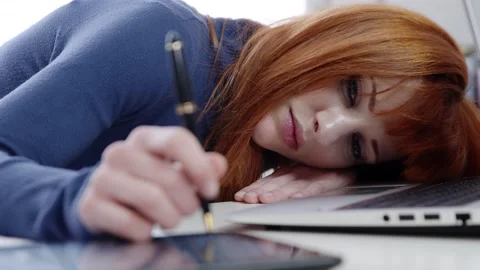 Young beautiful red haired overworked business woman in office Stock-Footage 170733157