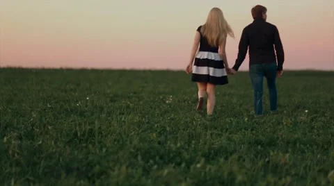 Young beautiful sensual pair is in the sunset Video stock 62751886