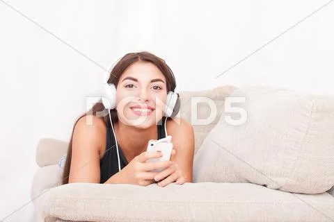 Young beautiful woman in headphones Stock Photos