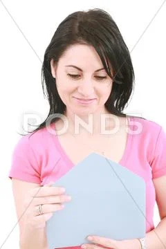 Young beautiful woman opening a letter isolated on a white background Stock Photos