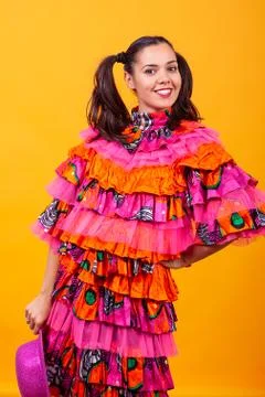 Young beautiful woman wearing a mascarade latino costume Stock Photos