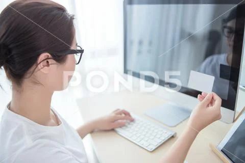 Young beautiful woman working in the office Stock Photos