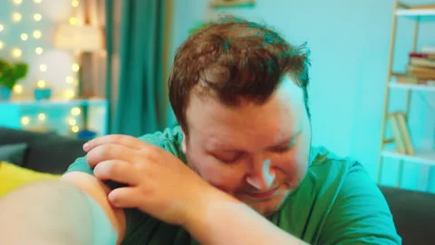 Young big man take camera and start to recording a sad video he crying and Video stock 146476398