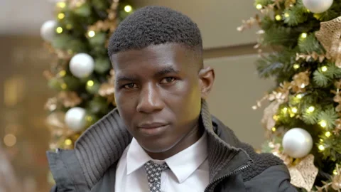 Young black businnessman looking at camera and smiling - outdoors Video stock 132510831