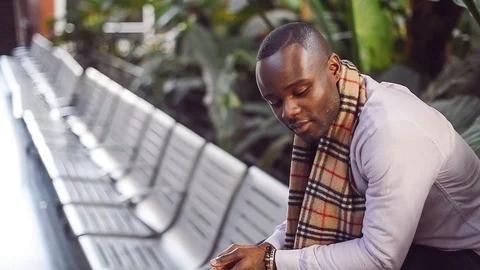 Young black elegant man posing at train station Stock Footage 86468283