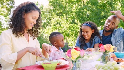 Young black family having a lunch togeth... | Stock Video | Pond5