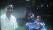 Young Black Family Of Three In The Backyard 1950S Vintage Film Home Movie 3548 Stock Footage