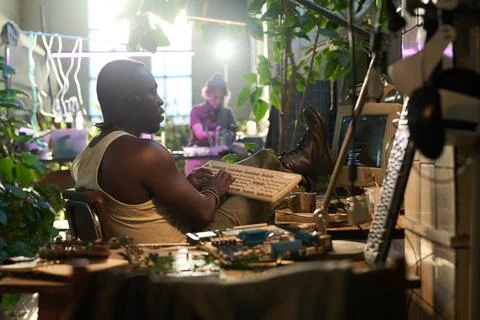 Young Black Hacker Coding On Old Computer Stock Photos