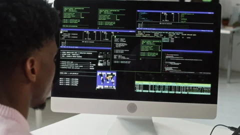 Young Black Male IT Developer Programming on Computer Typing Code at Office Desk Video stock 330129284