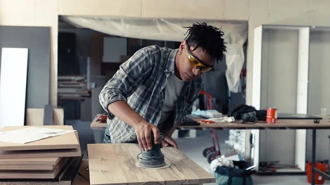 Young black man carpenter Stock Footage 155357614