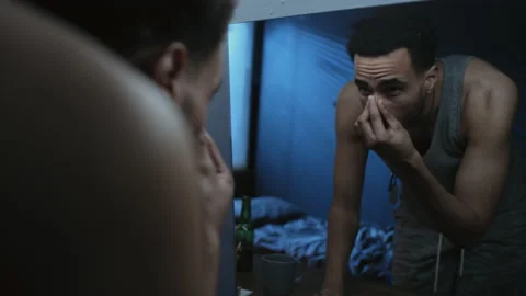 Young Black Man Looking In Mirror After Nightmare 스톡 동영상 230933300