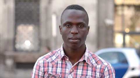 Young black man making "no" with his finger- outdoor Stock Footage 80681879