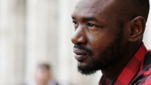 Young black man pensive: future, life- close up Stockbeeldmateriaal 85693573