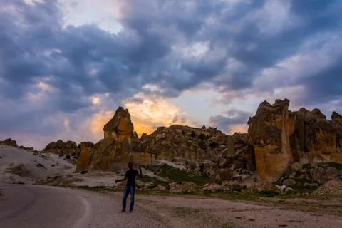 Young black man posing in front of Frig ruins Stock Photos