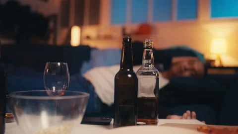 Young black man sleeping after drinking, burning his life, crisis and problems Stock Footage 246627329