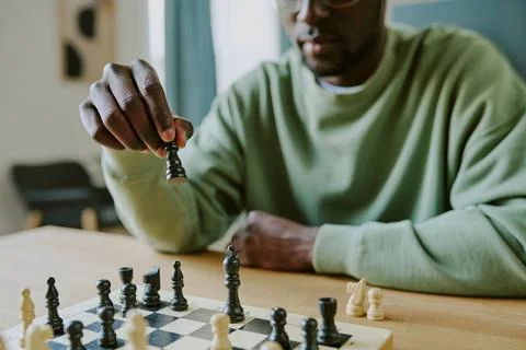 Young Black Man Solving Chess Problem Stock Photos