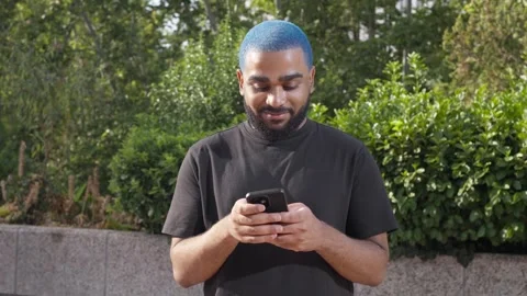 Young black man using a smartphone, technology 스톡 동영상 285660991