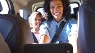 Young Black Mother Taking Photos With Two Children In A Car Stock Footage