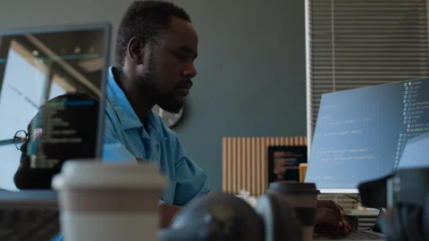 Young Black Programmer Developing Code Video stock 283205730
