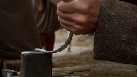 A young blacksmith at work Stock Footage 70548708