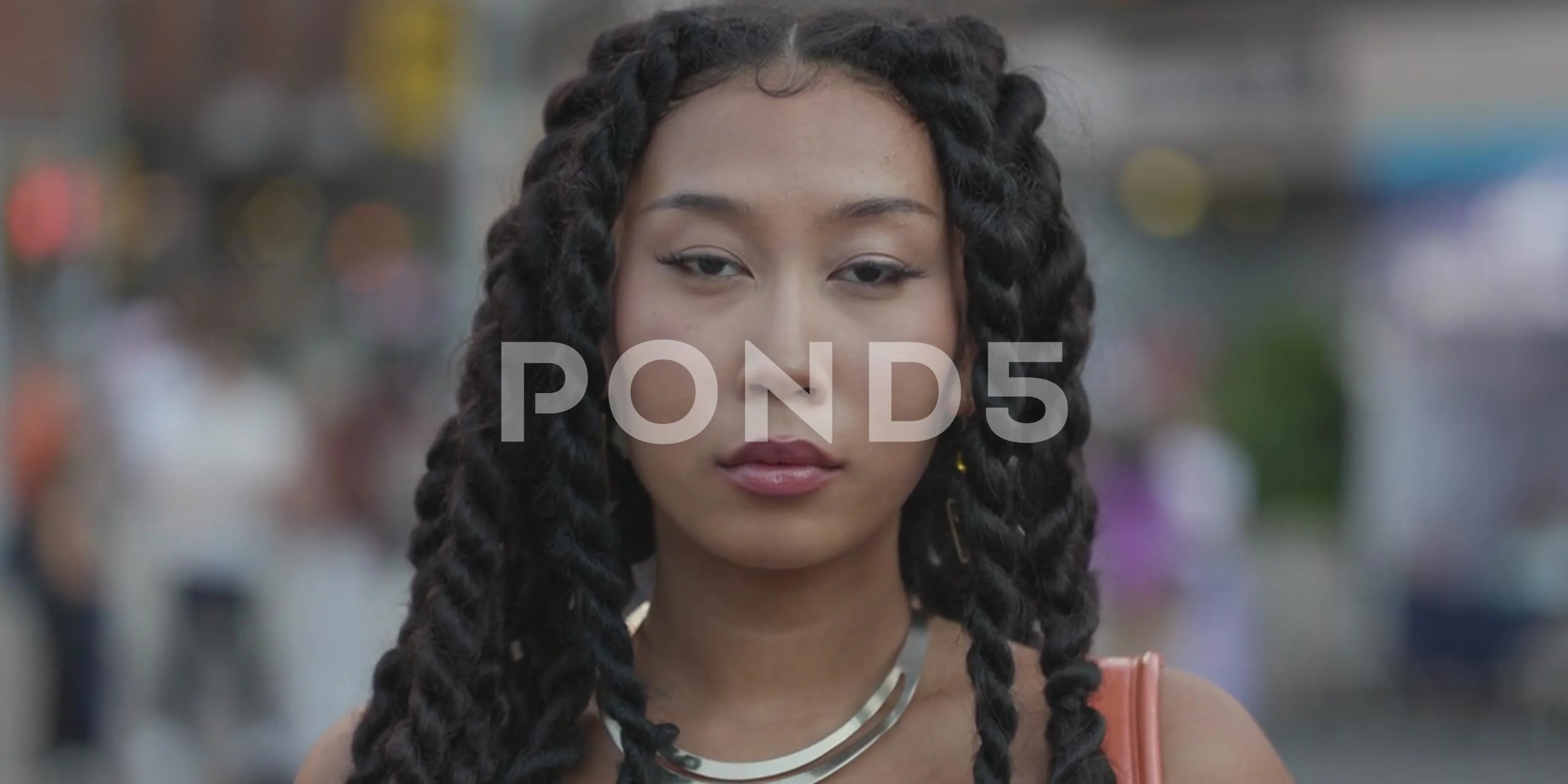 Young blasian Asian black bi-racial woman serious angry sad face portrait