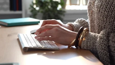 Young Blogger at Work Typing her New Post Stock Footage 107249158