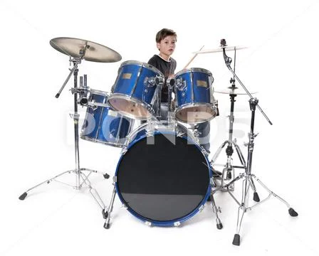 Young blond boy at drum kit in studio Stock Photos