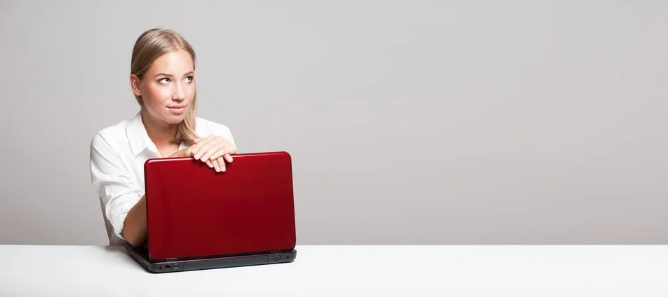 Young blond computer user. Stock Photos