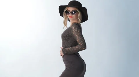 Young blond girl posing in studio Video stock 32721567