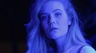 Young Blonde Beautiful Girl Fashion Looks At Blue Neon Light Portrait At Night Stock Footage