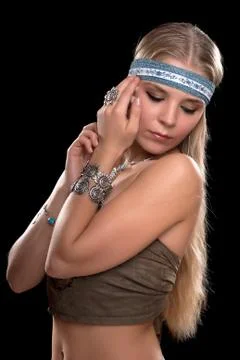 Young blonde in a capitium Stock Photos