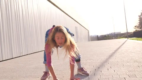 Young blonde dancer performing urban dance moves outdoors Stock Footage 303263941