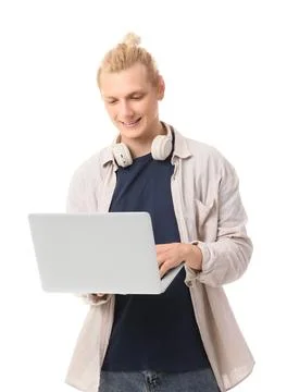 Young blonde man using laptop on white background Stock Photos