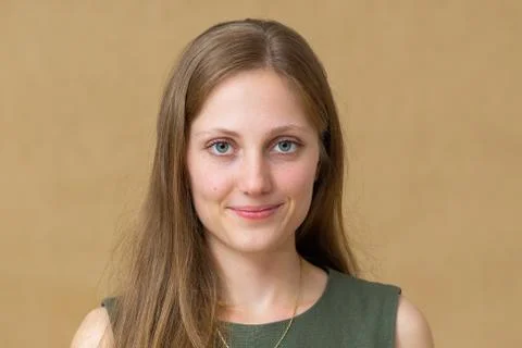 Young blonde model smiling to the camera in studio Stock Photos