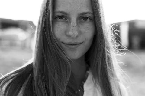 Young, blonde model smiling to the camera. Stock Photos