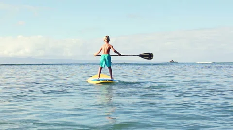 Young Blonde Surfer Boy Stand Up Paddling. Stock-Footage 54301225