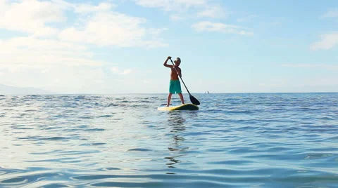Young Blonde Surfer Boy Stand Up Paddling. Stock-Footage 54301585