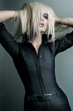 Young blonde in a vampire look Stock Photos