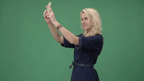 Young blonde woman making selfie Stock Footage 70210341